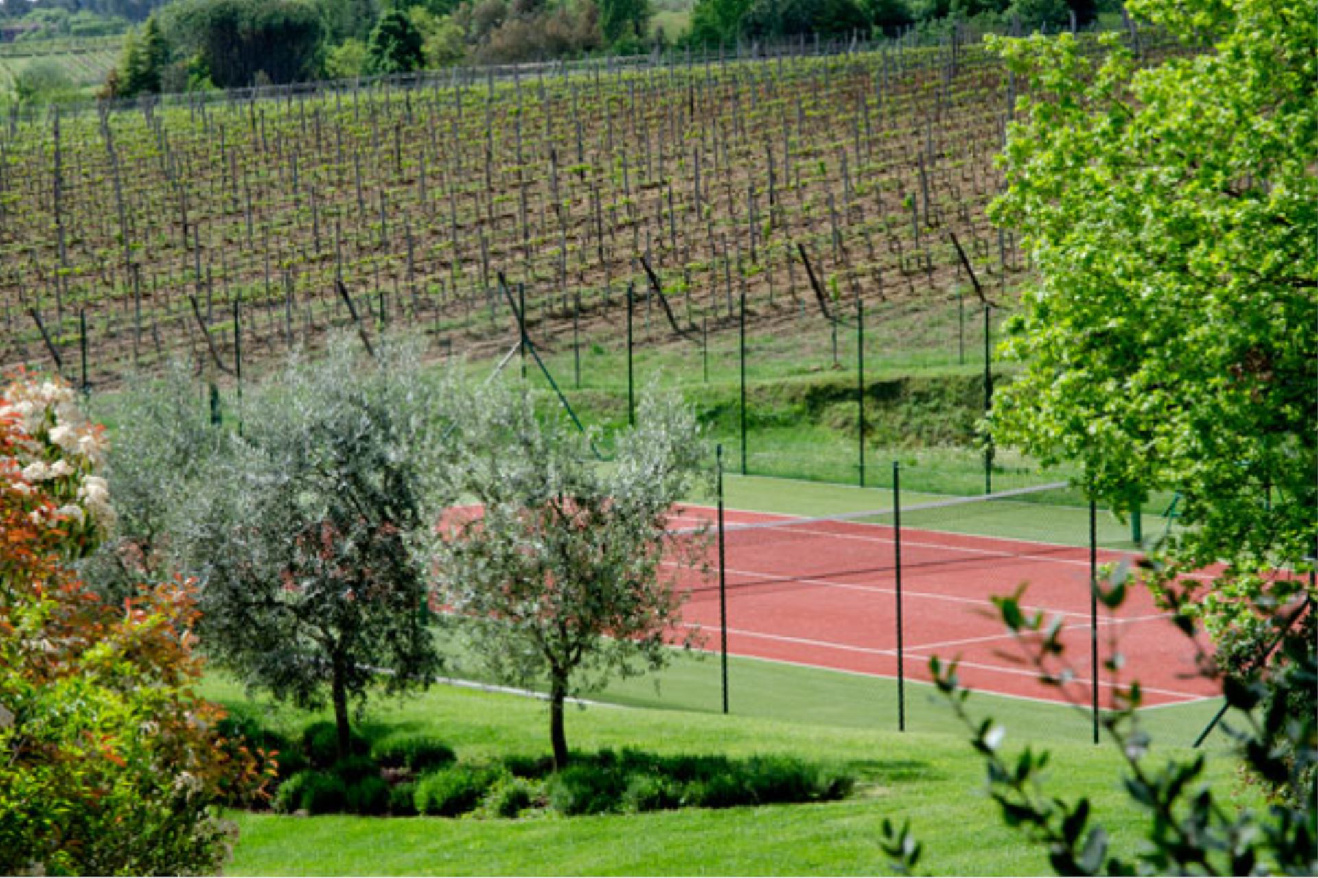 Tennis court at Villa I Grandi di Toscana sleeps 33, private pool